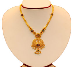 Artistic gold necklace.