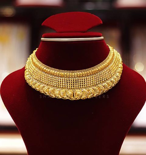 short gold necklace